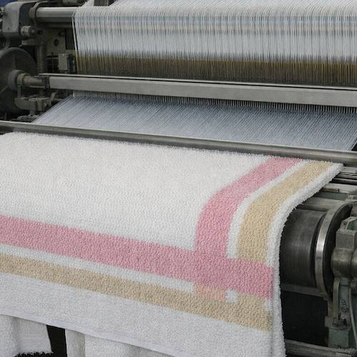 Textile mill improves moisture regain, yield and equipment reliability in towel packing through TPM